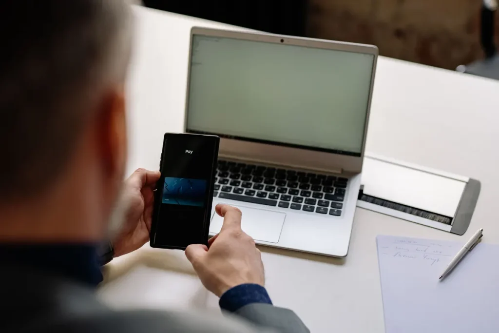 Payoneer alternatives Pakistan — freelancer receiving an international payment on a laptop